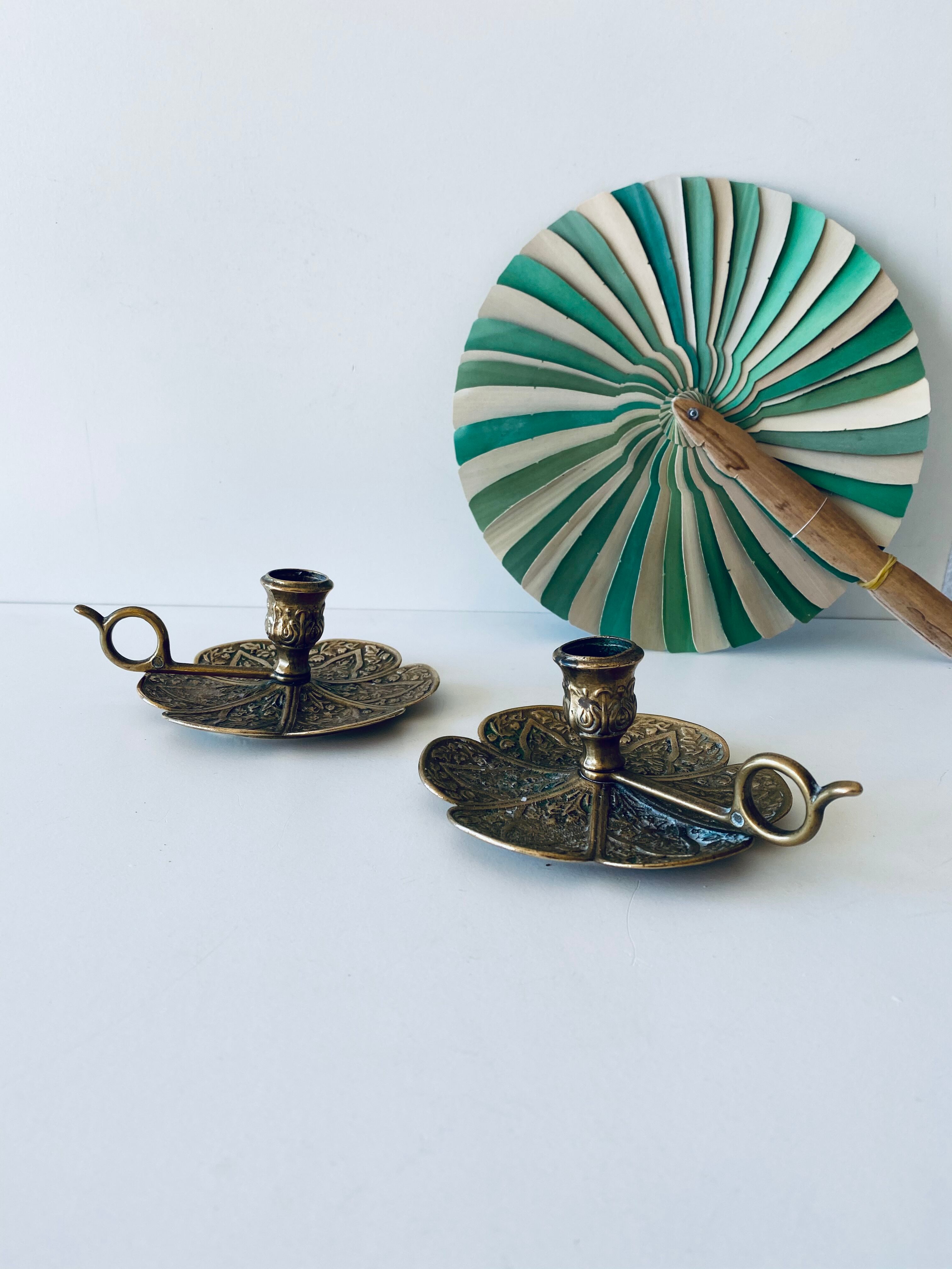 Pair of brass clover candlesticks