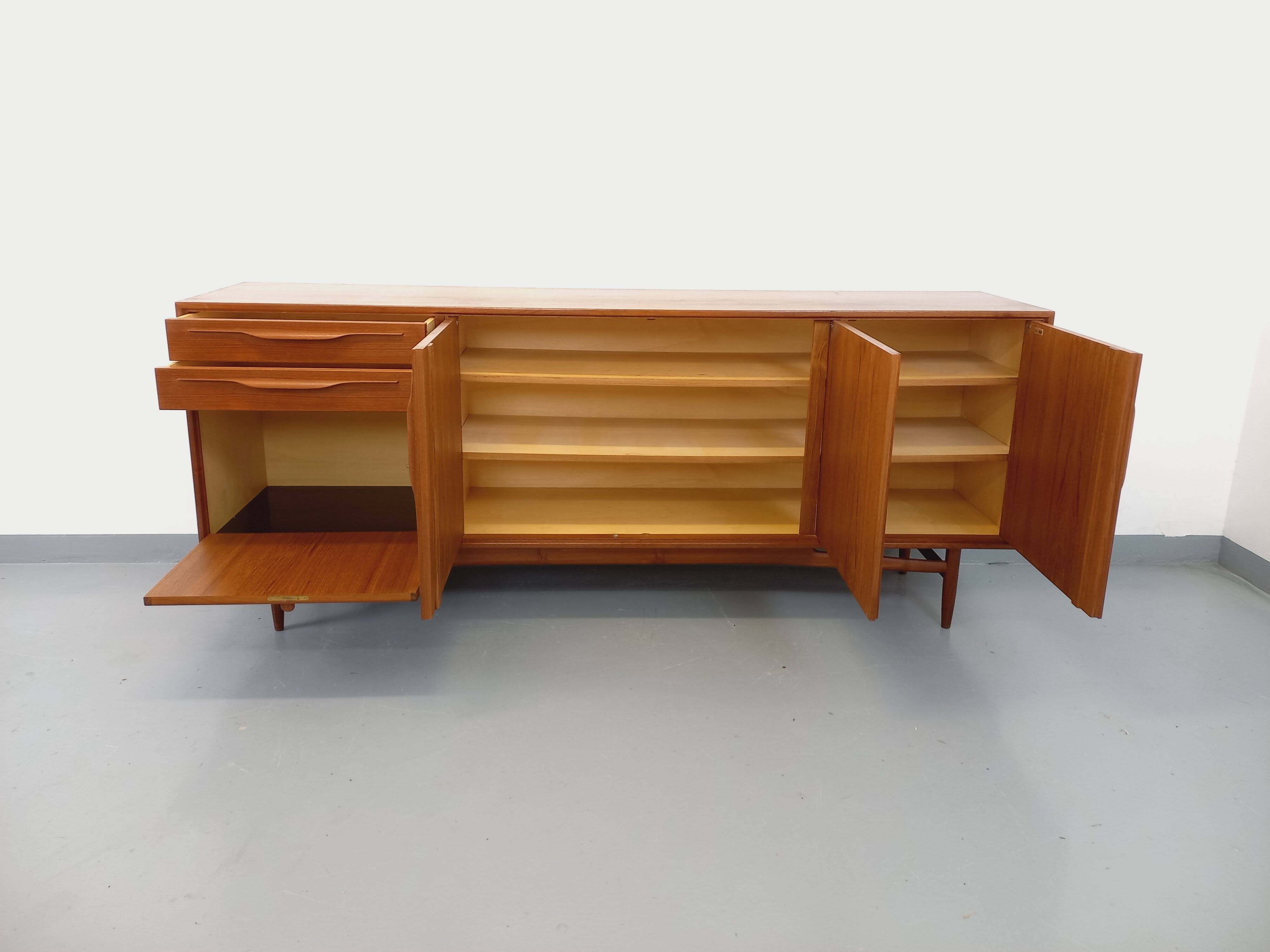 Vintage Swiss Teak Scandinavian style sideboard in teak from the 60s