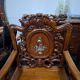 Pair of Asian armchairs in carved wood with mother-of-pearl inlays.