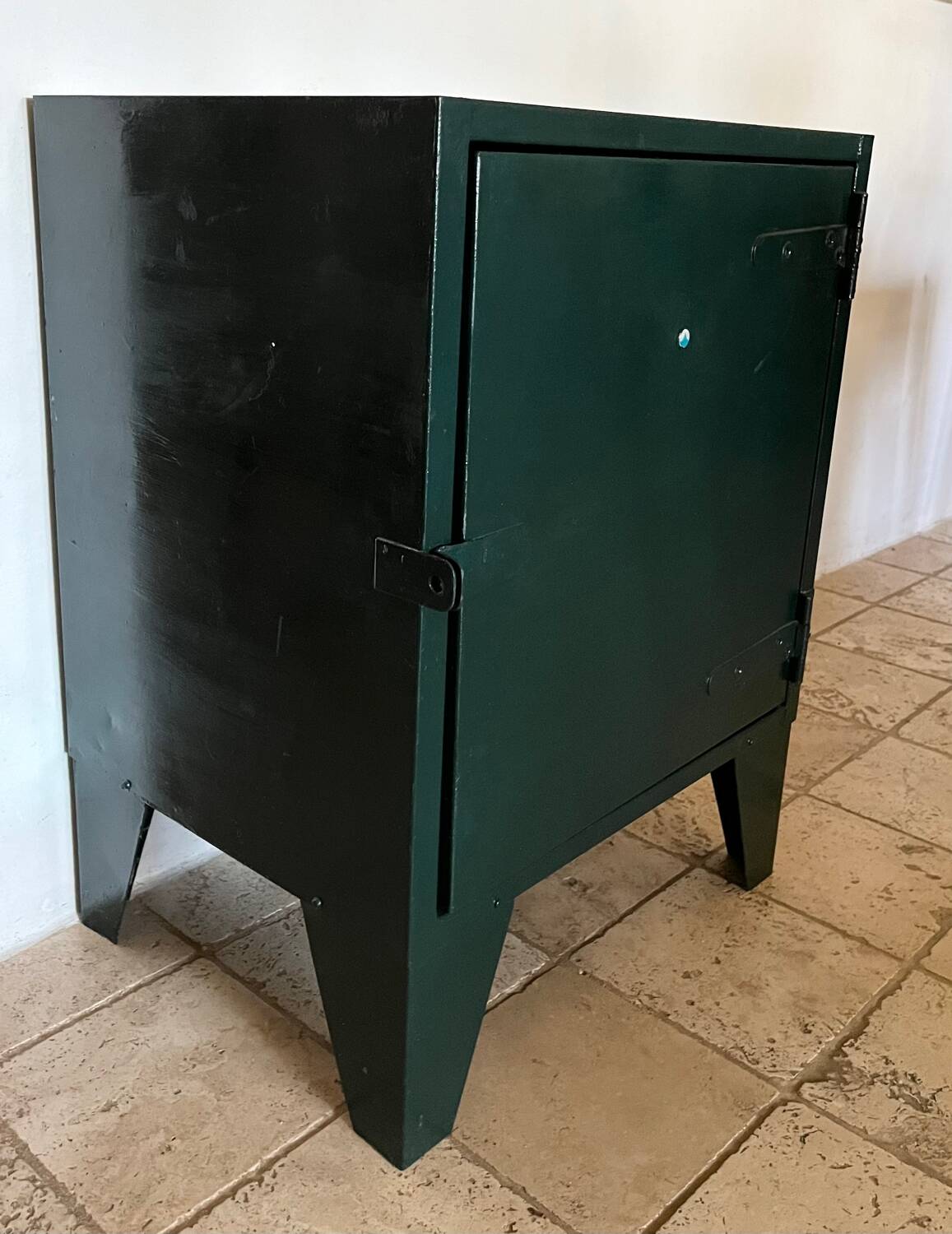 Small dark green industrial furniture