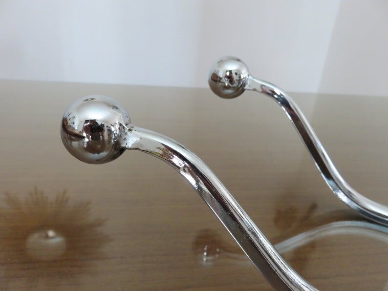 Pair of chrome metal pads 70s