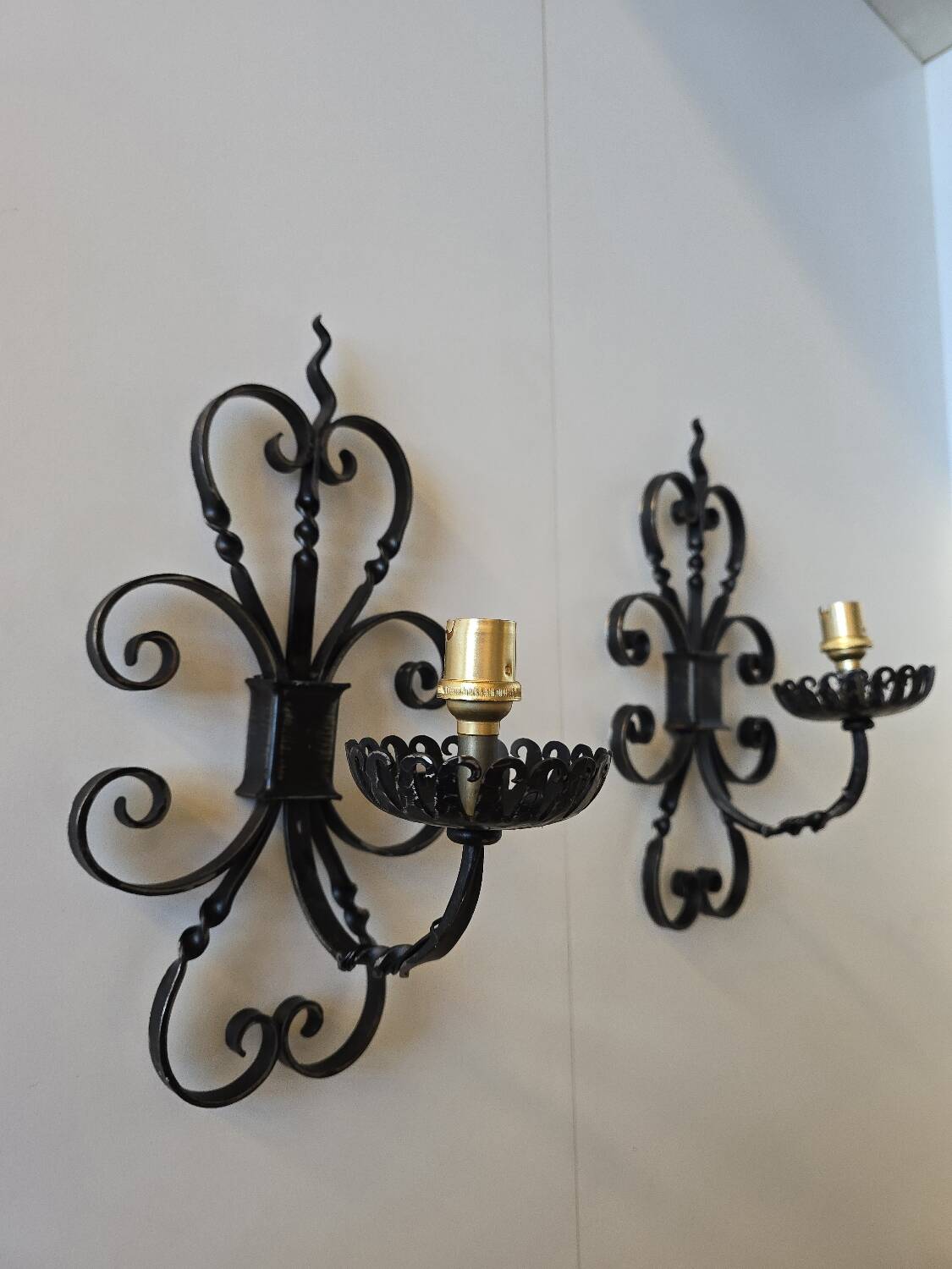 Pair of wrought iron wall sconces