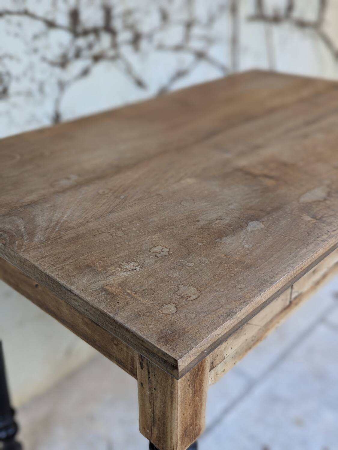 Solid wood desk, black base