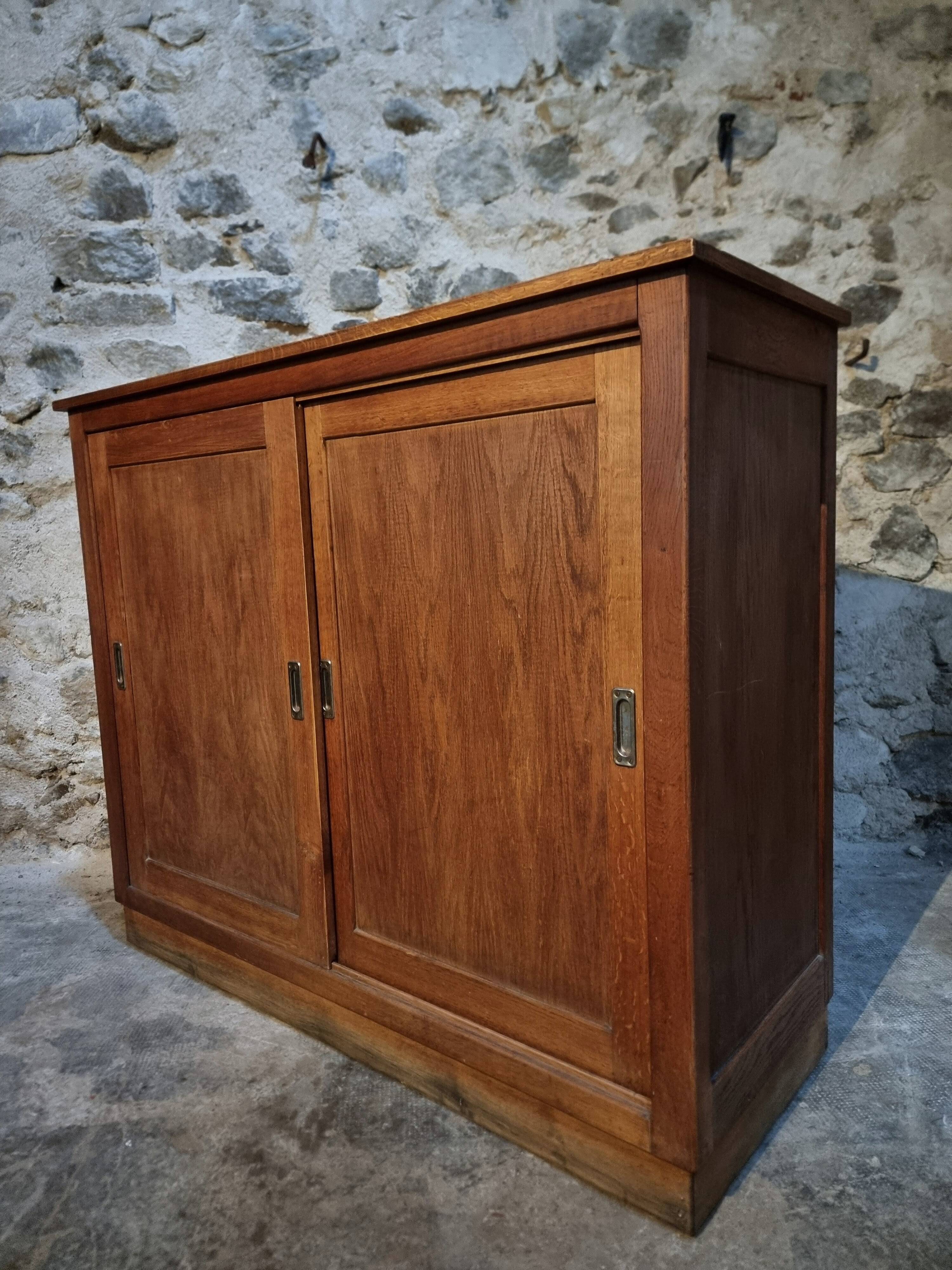 Oak sliding door wardrobe, 1920s