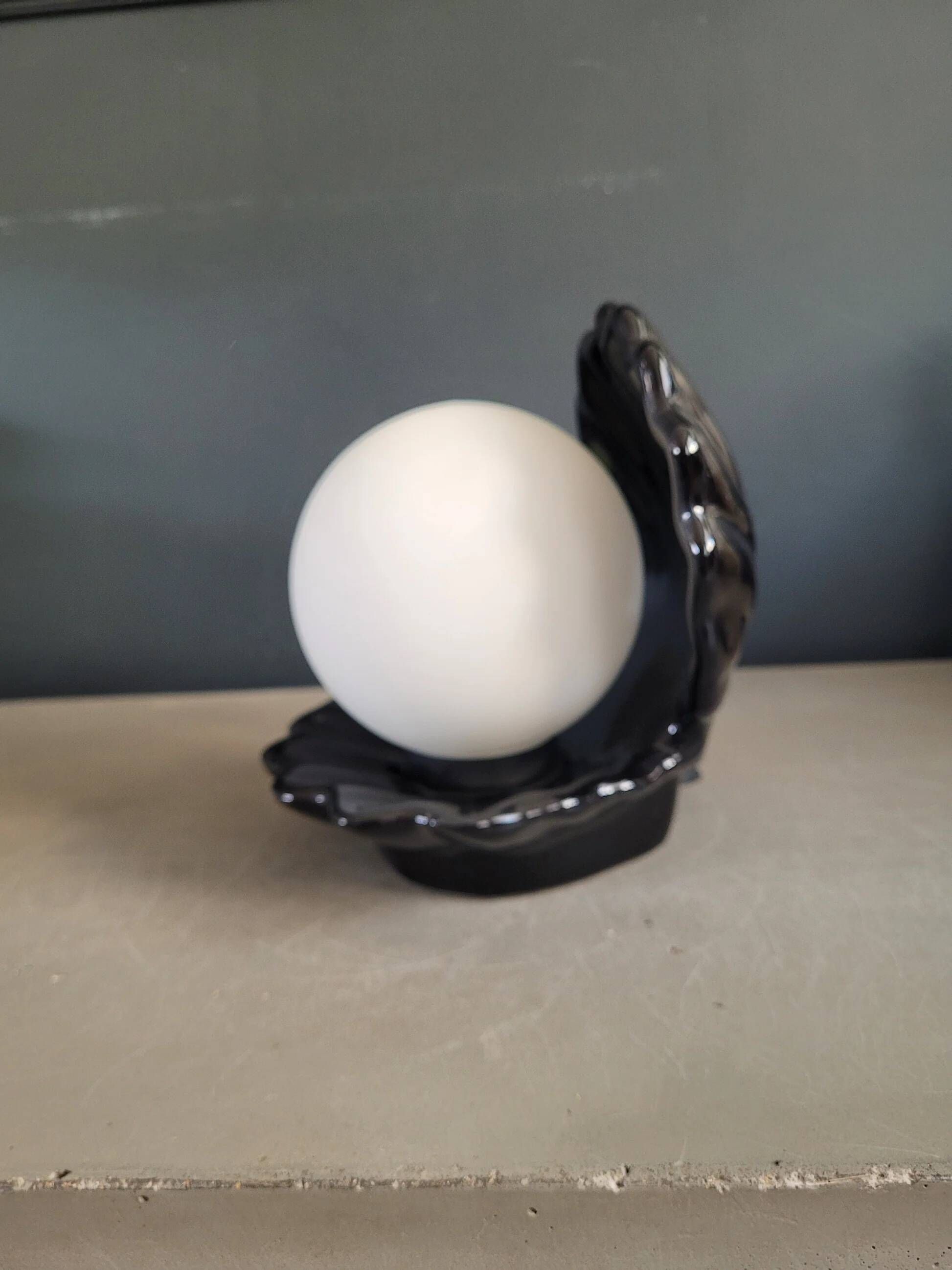 Vintage shell lamp in black porcelain with opaline globe.