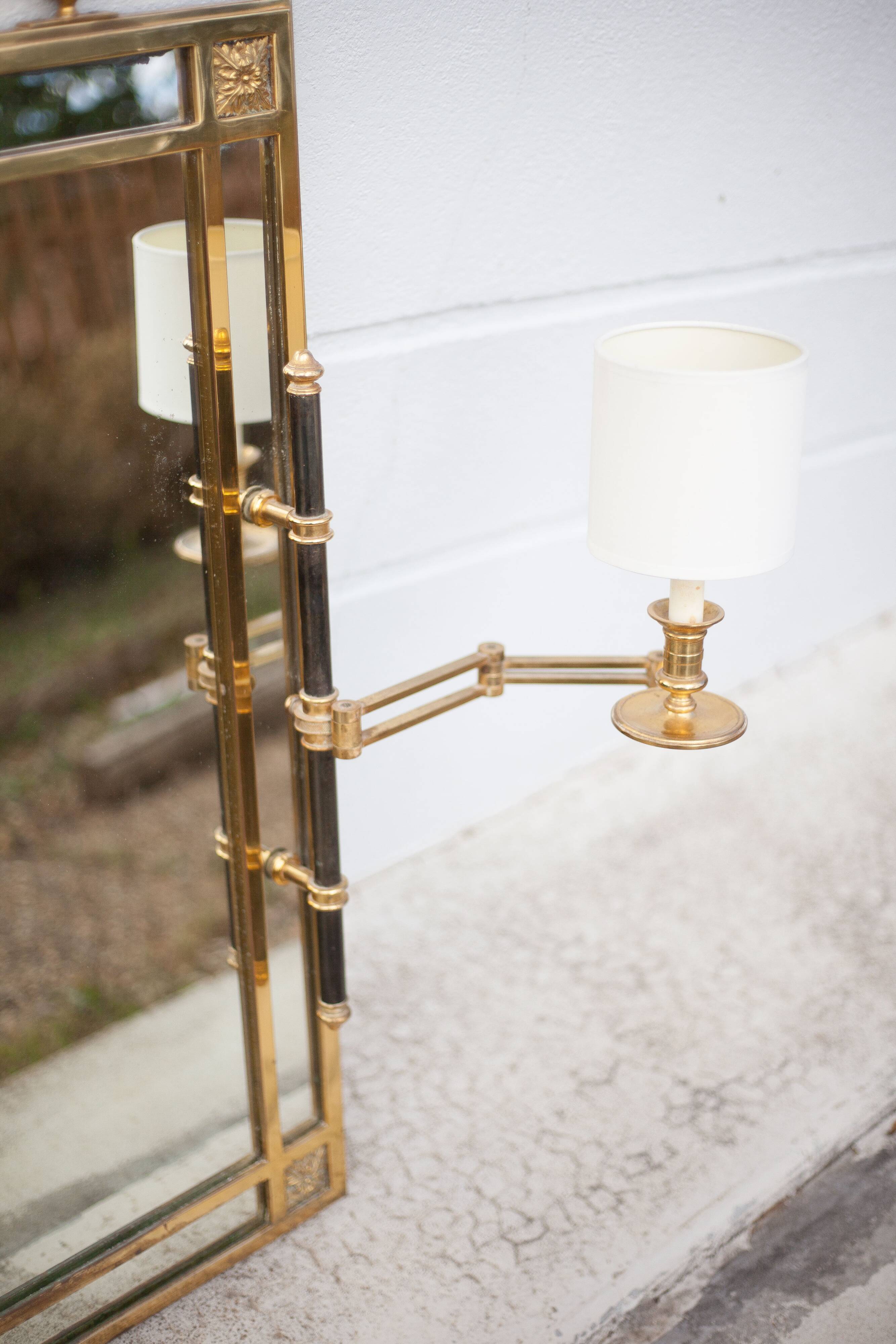 mirror with articulated wall light