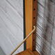 Wooden and metal wall shelf