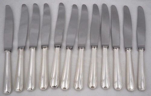 Christofle America, Art Deco 12 table knives, silver-plated, excellent condition.