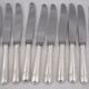 Christofle America, Art Deco 12 table knives, silver-plated, excellent condition.