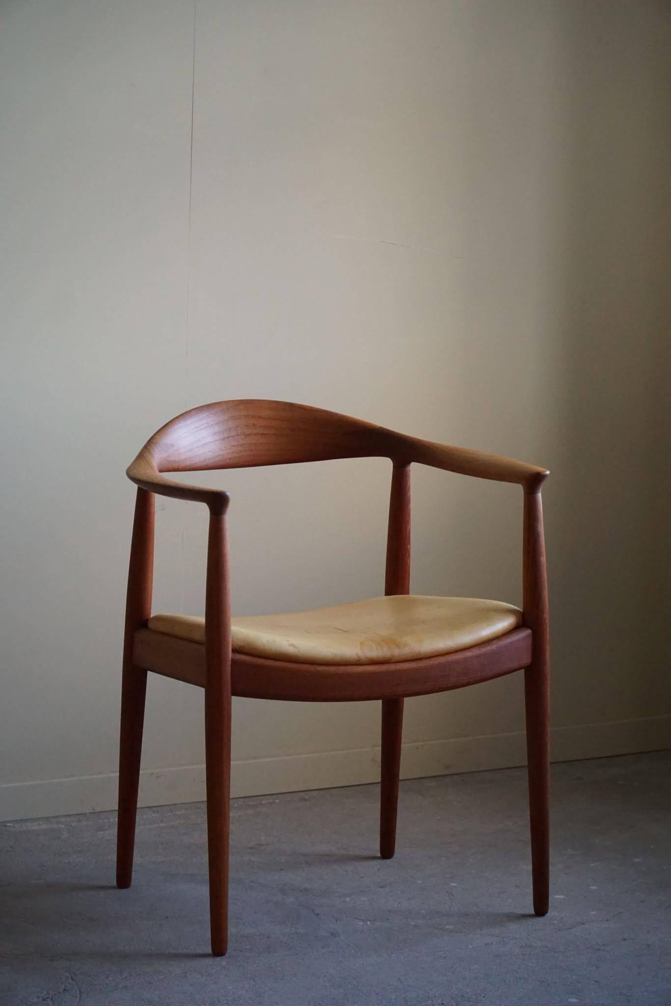 Hans J. Wegner, Teak and leather armchair, model "The Chair" JH501, 1950s