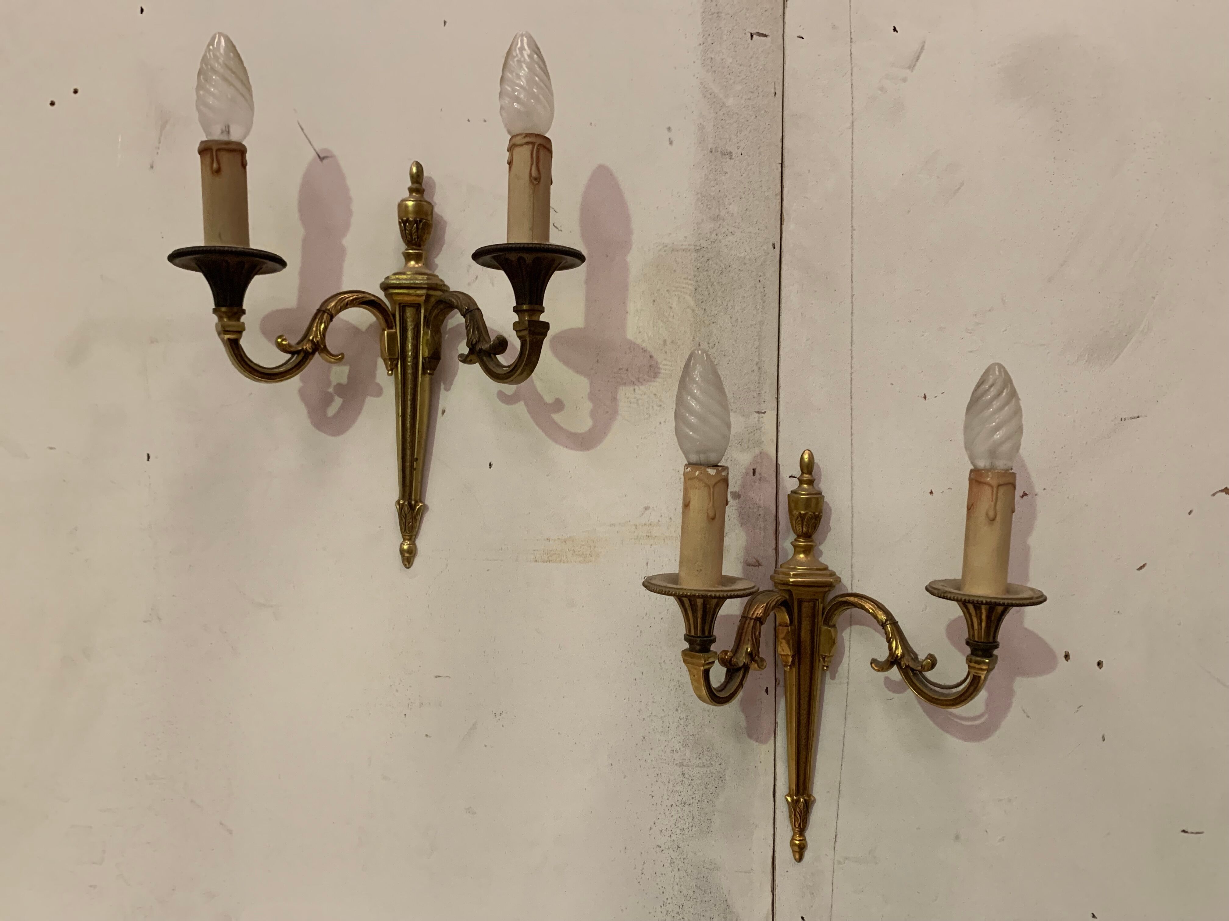 Pair of Louis XV style sconces in gilded bronze XX century