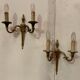 Pair of Louis XV style sconces in gilded bronze XX century