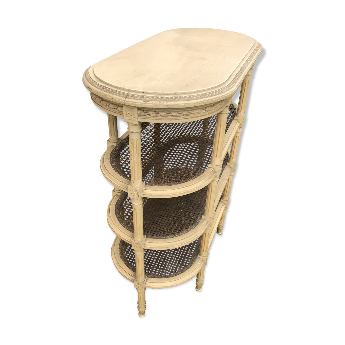 Wooden saddle on three shelves