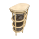 Wooden saddle on three shelves