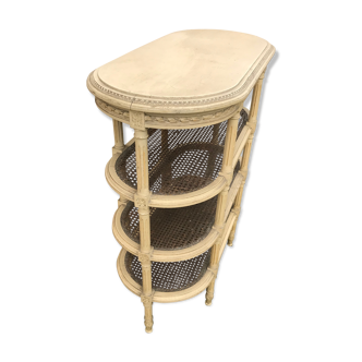 Wooden saddle on three shelves