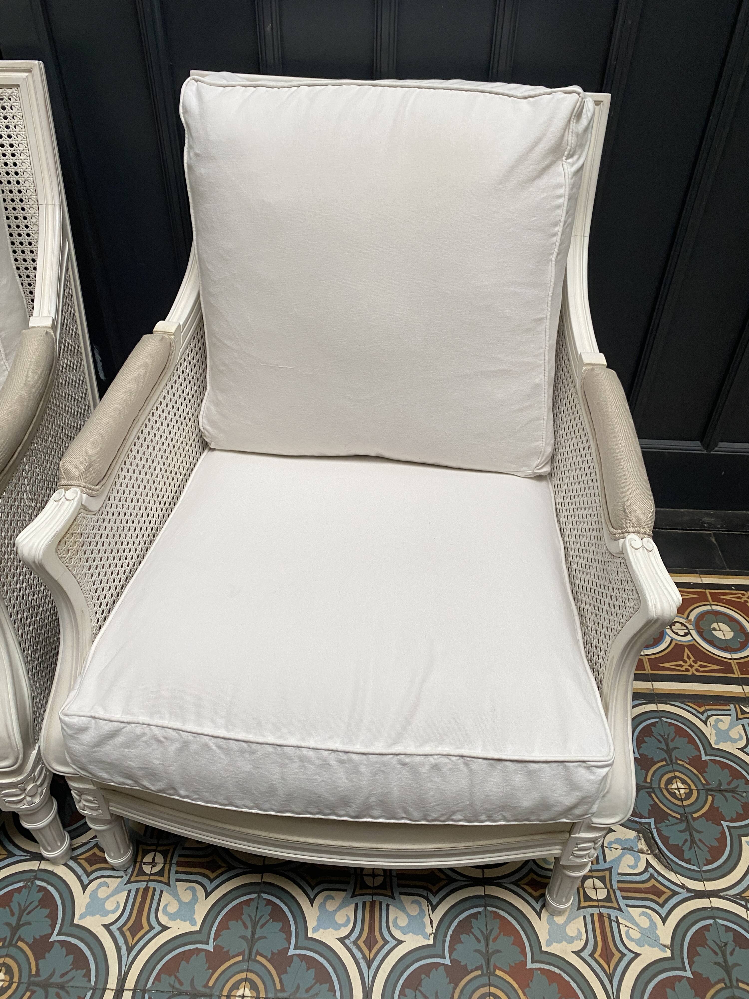 Pair of Louis XVI style caned Bergère armchairs