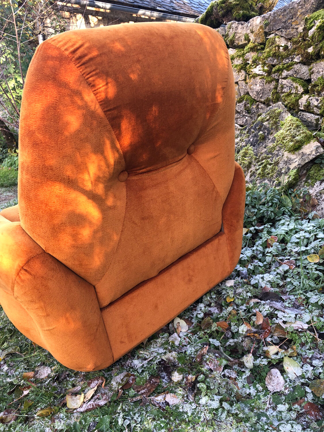 Orange velvet armchair