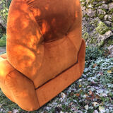 Orange velvet armchair