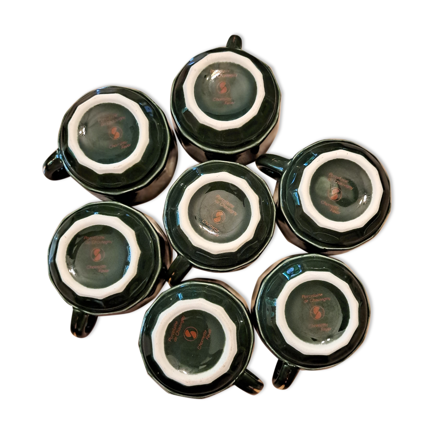 Green and gold coffee cups and sub-cups