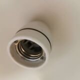 Spherical pendant lamp in sunny yellow.