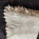 White cotton bedspread, crocheted sofa throw with star patterns