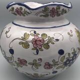 Round earthenware vase with polychrome floral motifs, signed