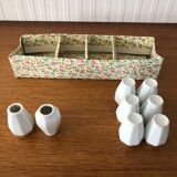 8 miniature vases in white earthenware