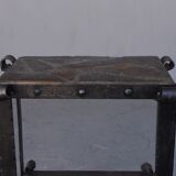 Pair of wrought iron and lava stone bedsides