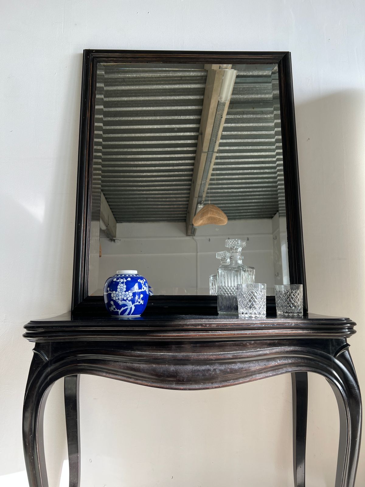 Rectangular mirror in molded blackened wood, beveled glass