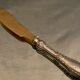 Couteau à beurre manche métal argenté ou argent style Régence lame métal doré