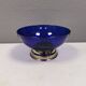 Beautiful blue glass bowl mounted on silver colored base (Original).