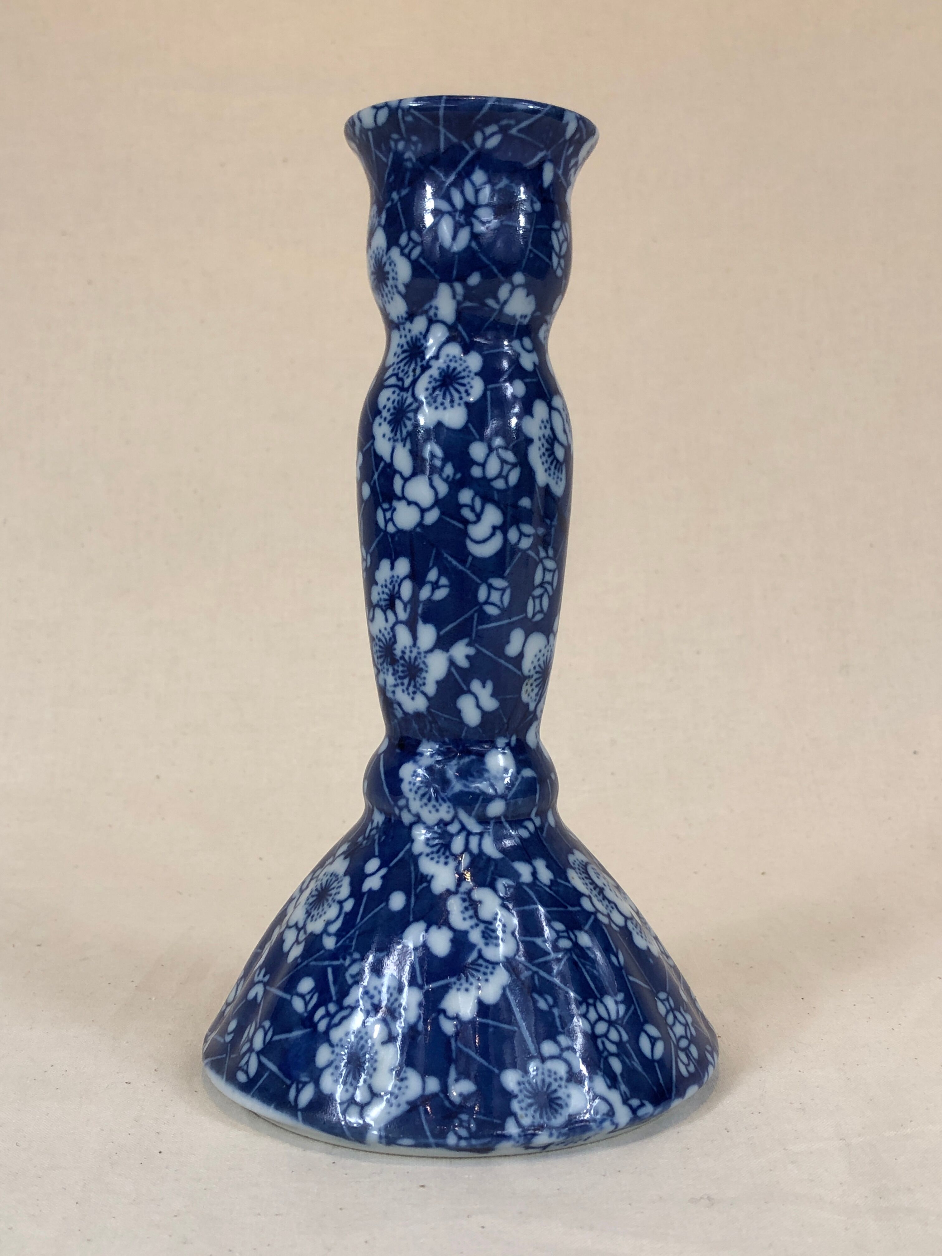 Blue ceramic candle holder pattern small white flowers