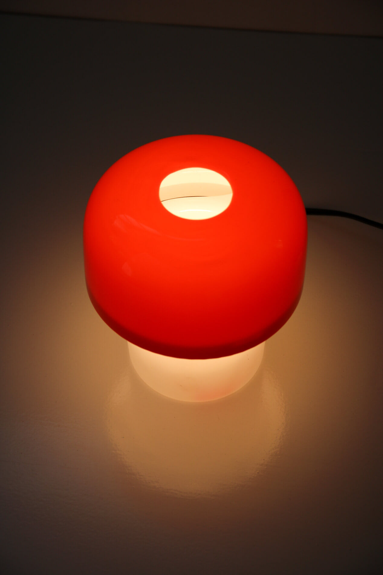 Vintage space age red table lamp from Luigi Massoni for Guzzini, 1970s