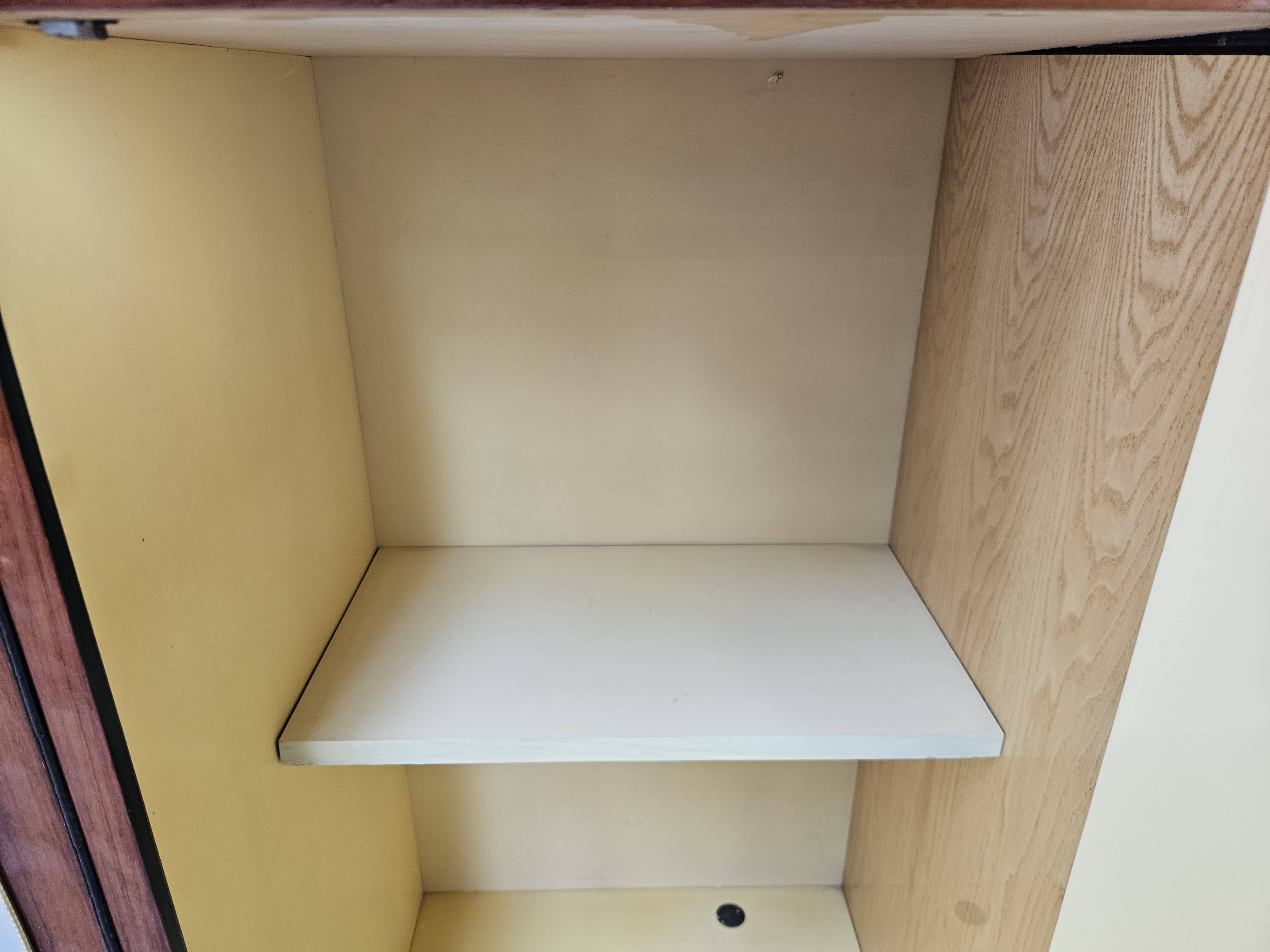 Mid-century 1960s mahogany showcase with glass top