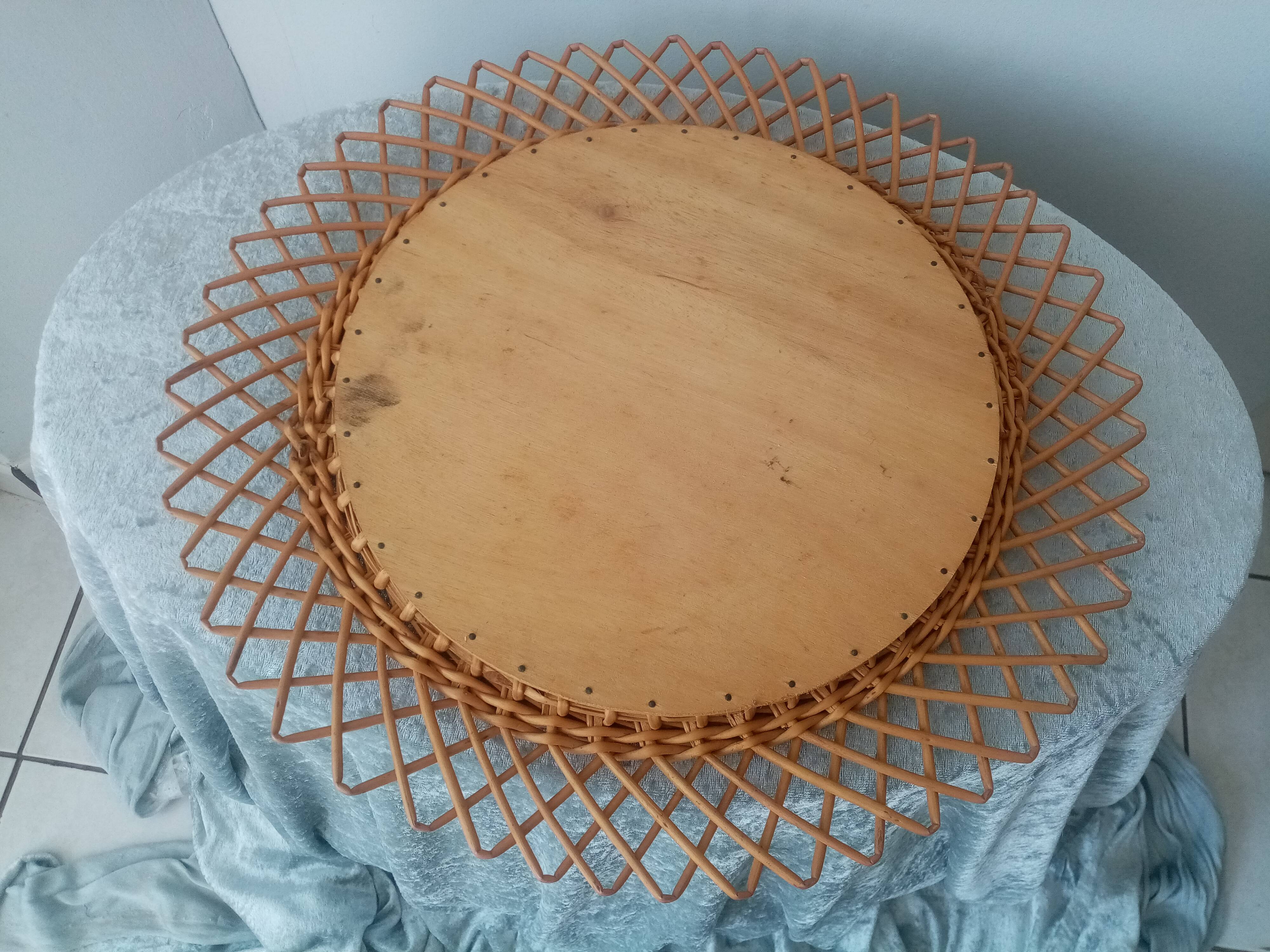 Old vintage sun mirror in rattan braid 60 years