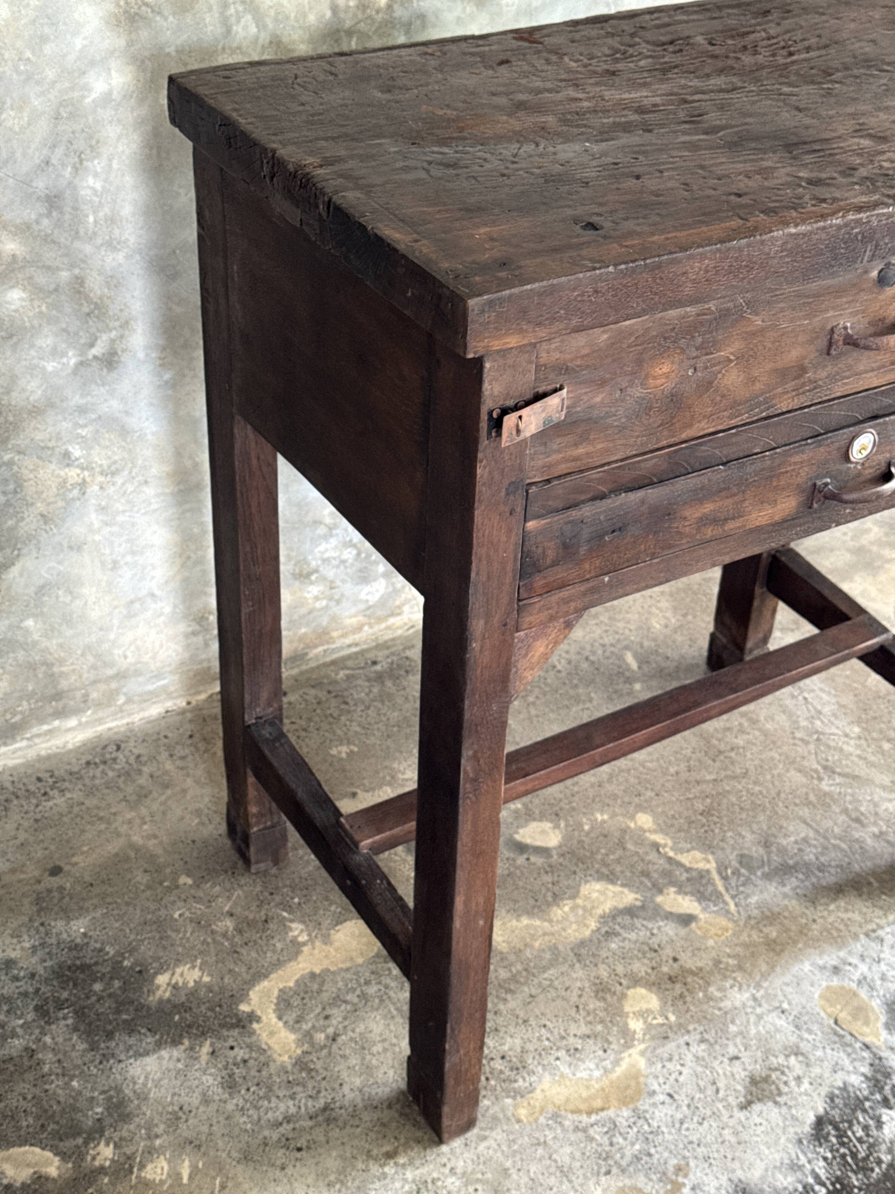 Antique Indonesian teak workbench with two drawers and stretcher H89.