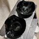 2 black shell cups