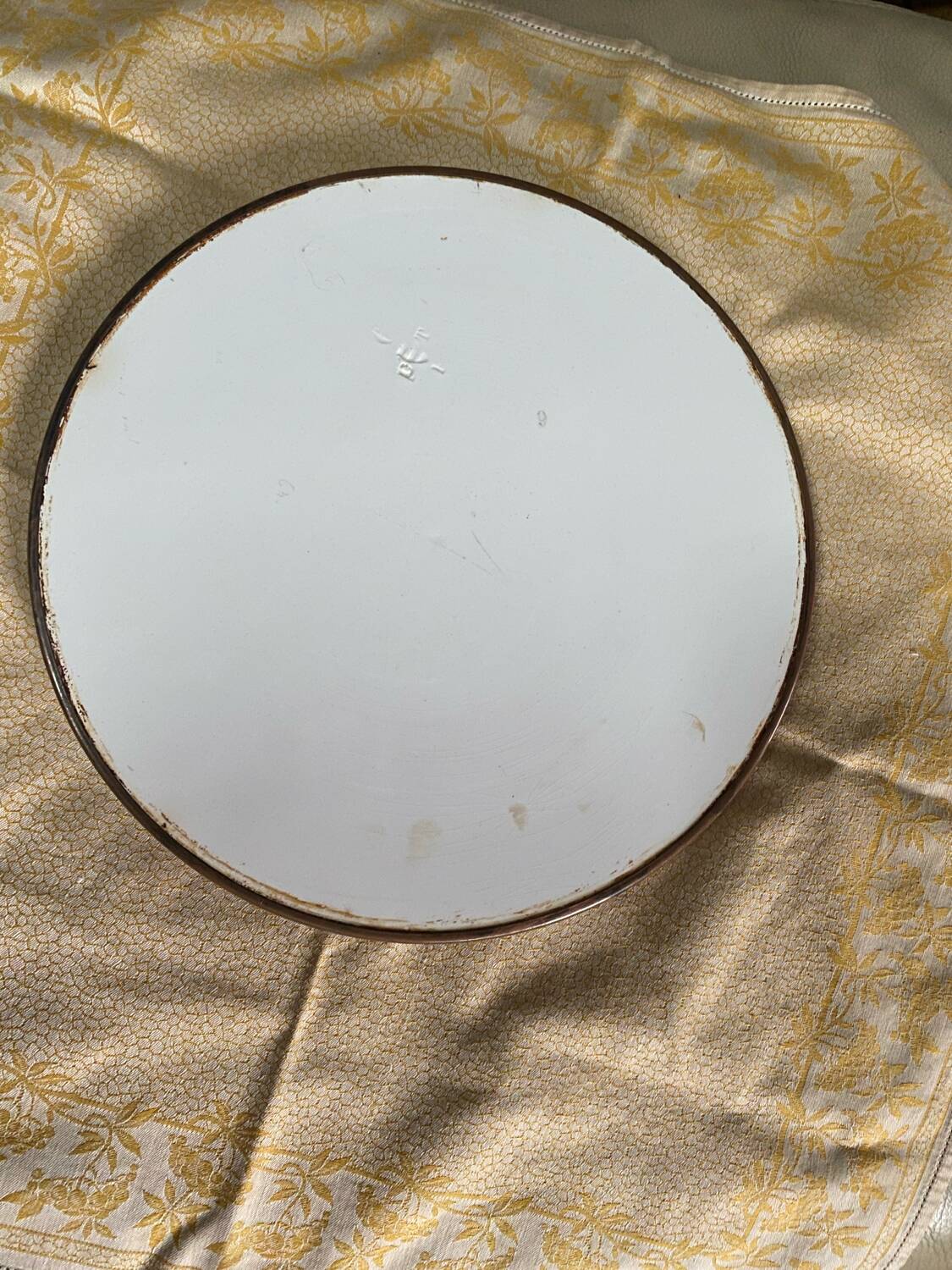 Ancient ceramic platter and bottle coaster