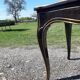 Napoleon III black lacquered wood and brass table