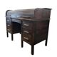 Vintage American wooden desk with a roll-top.