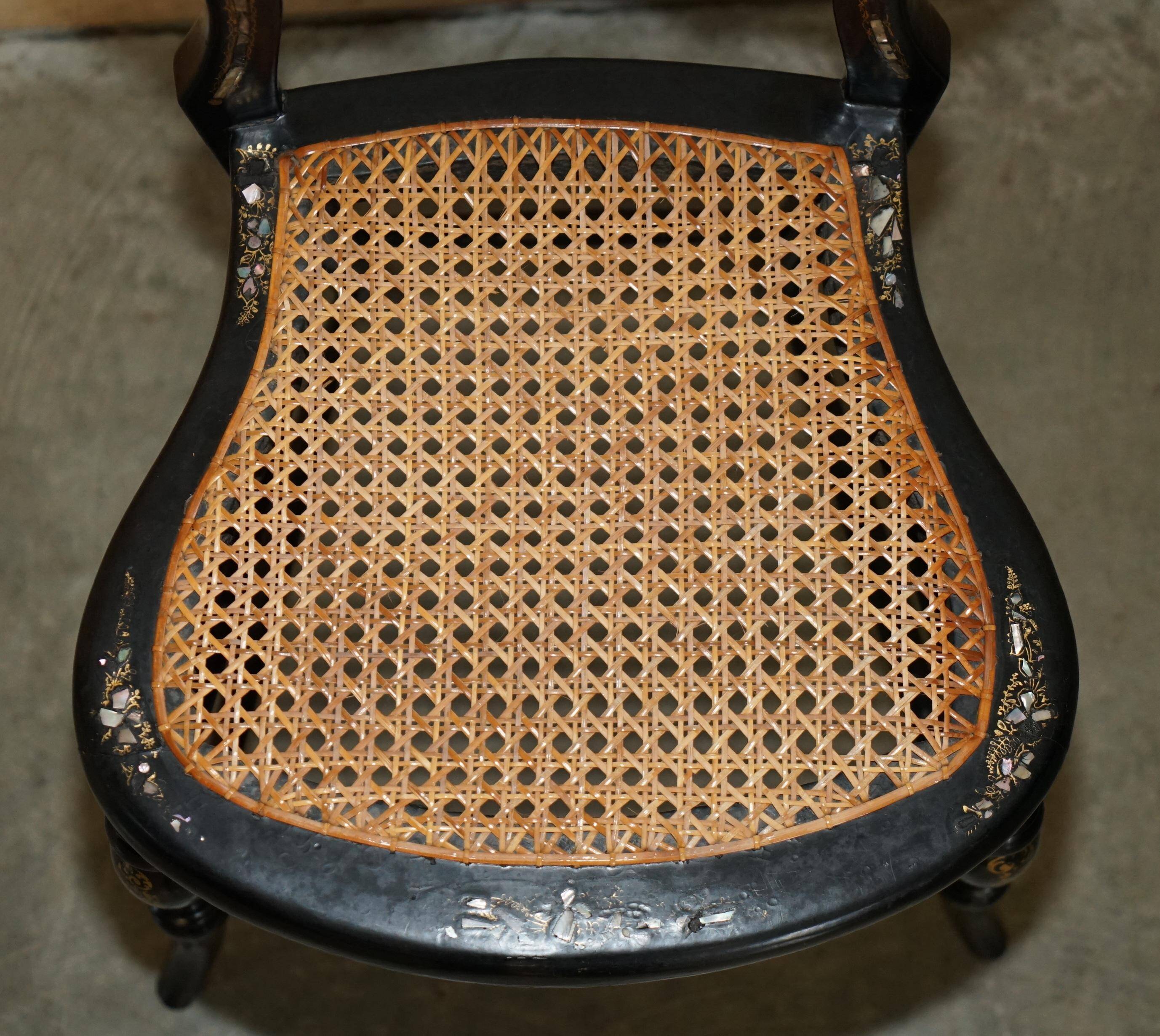 Four antique Regency bergère chairs with mother-of-pearl inlay.