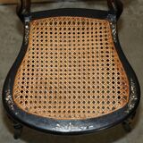 Four antique Regency bergère chairs with mother-of-pearl inlay.