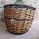 Dame-jeanne in her basket