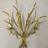 Sconce in golden iron