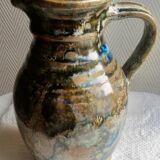 Enamelled ceramic pitcher, signature mb the terminal