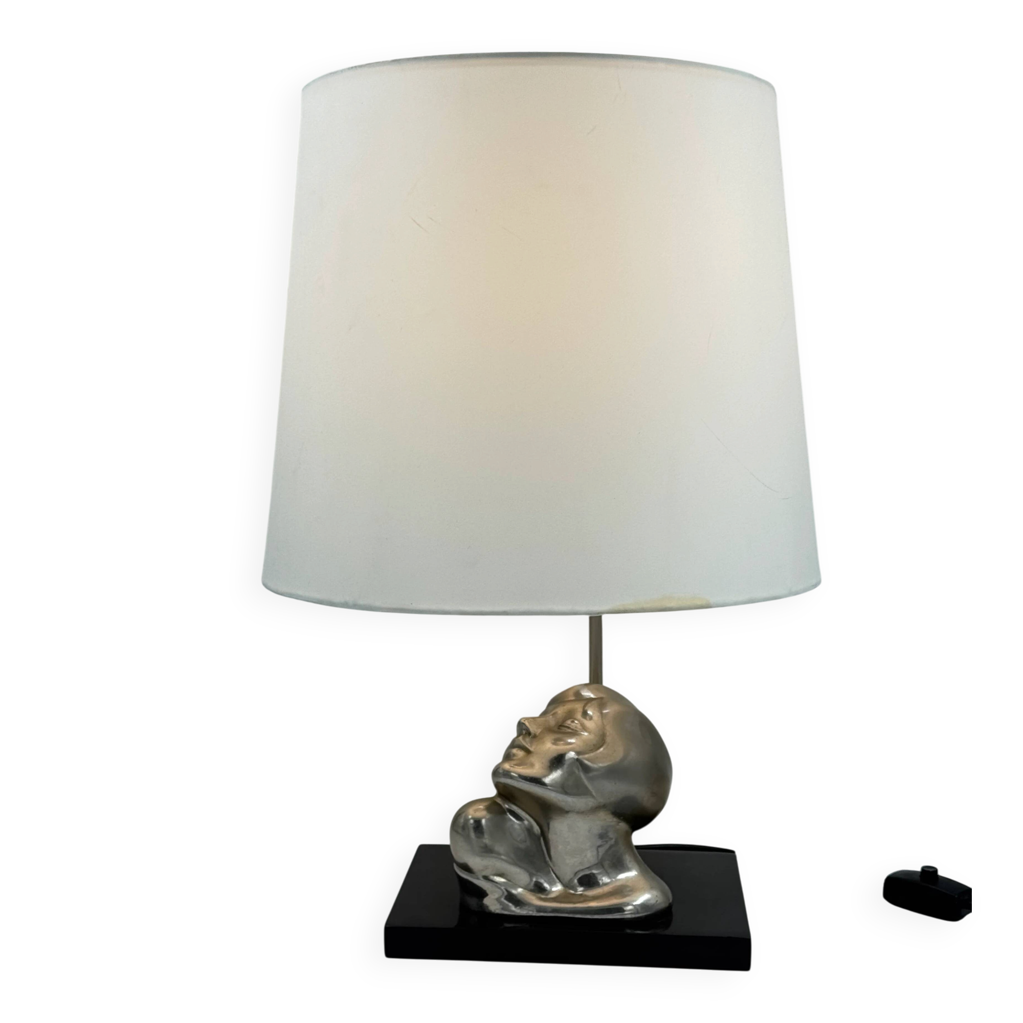 Vintage Art Deco style table lamp, face sculpture, silver-toned bust.