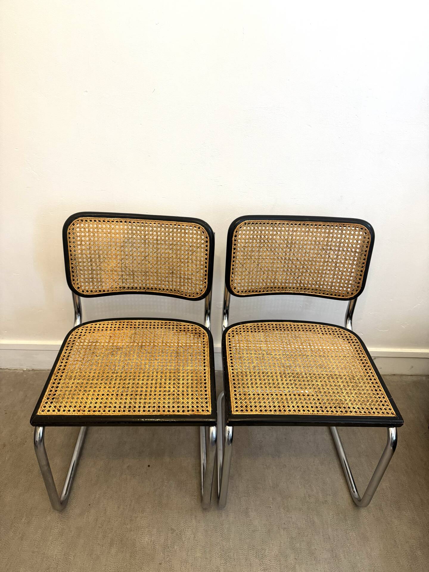 Pair of Marcel Breuer B32 Cesca chairs made in Italy.