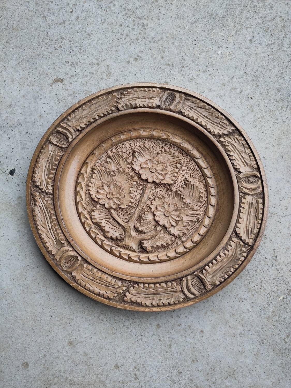 Round carved wooden dish