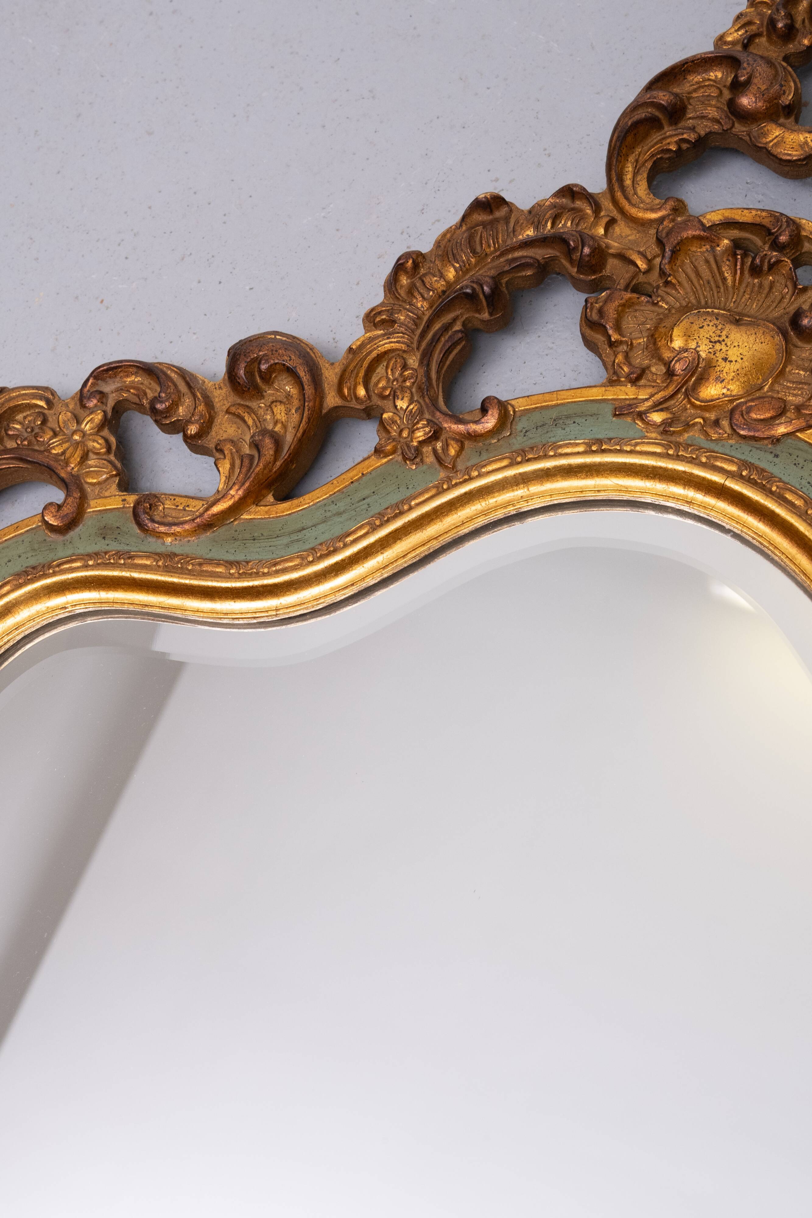 Baroque gilded Louis XV style beveled mirror with " Brevete" label, 1950s