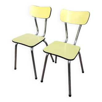 Pair of yellow formica chairs